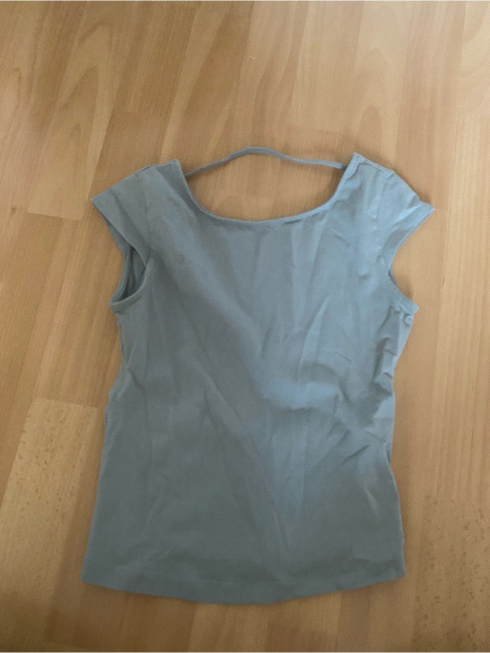 Garage turquoise mid length open back top